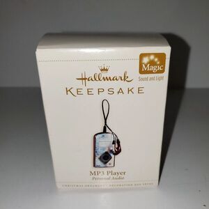 A Hallmark Keepsake Ornament Magic Sound & Light MP3 Player 4 Christmas Songs